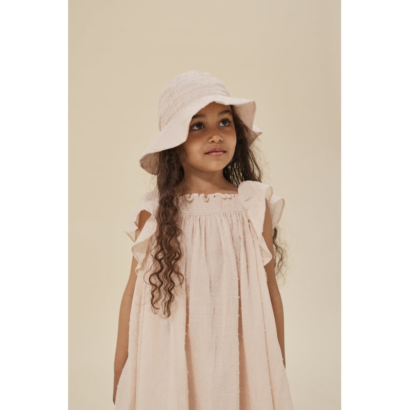 Robe en plumetis rose pâle