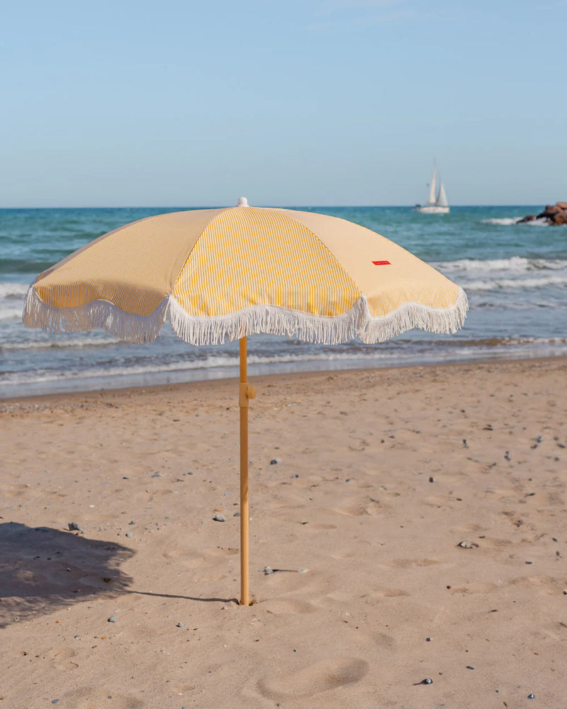 Parasol rayé jaune